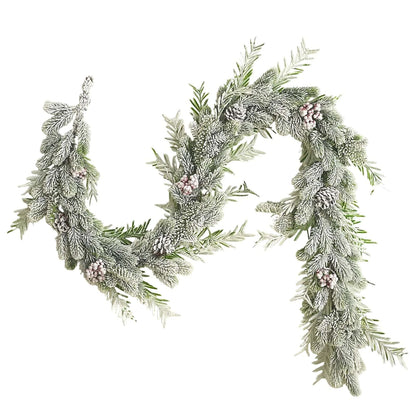 Decorative wreath with greenery and small pink flowers on a light background