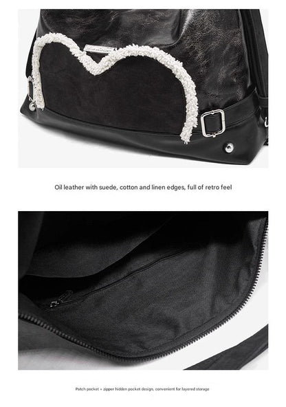 Stylish Black Tote Backpack with Heart Embellishment